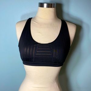 Joylab Black with Gold Pinstripe Sports Bra SZ Medium New Without Tags.